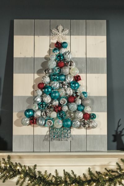 arboles de navidad hechos con bolas madera