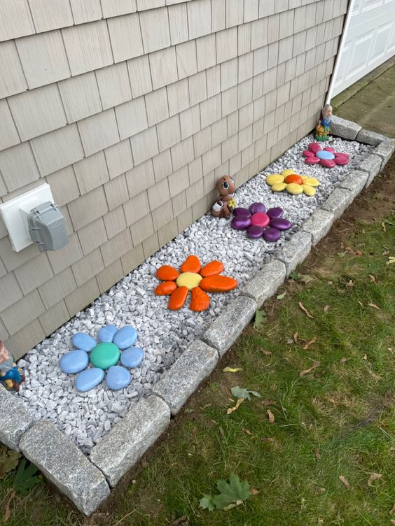 decoraciones jardines flores de piedras coloridas
