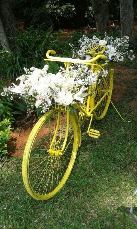 floreros hechos con bicicletas viejas