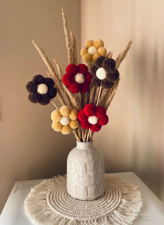 flores hechas con pompones