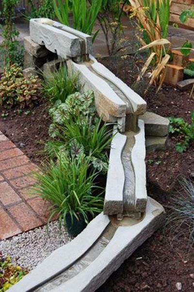 ideas de fuentes de jardin de madera 1