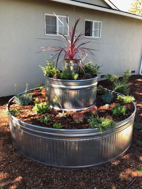 ideas usar tanque de acero galvanizado en tu jardin 7