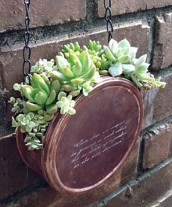 manualidades con latas de atun para el jardin 9